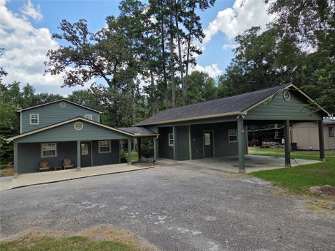 Photo of 15318 Arrowhead Loop W, Willis, TX 77378 (MLS # 92744870)