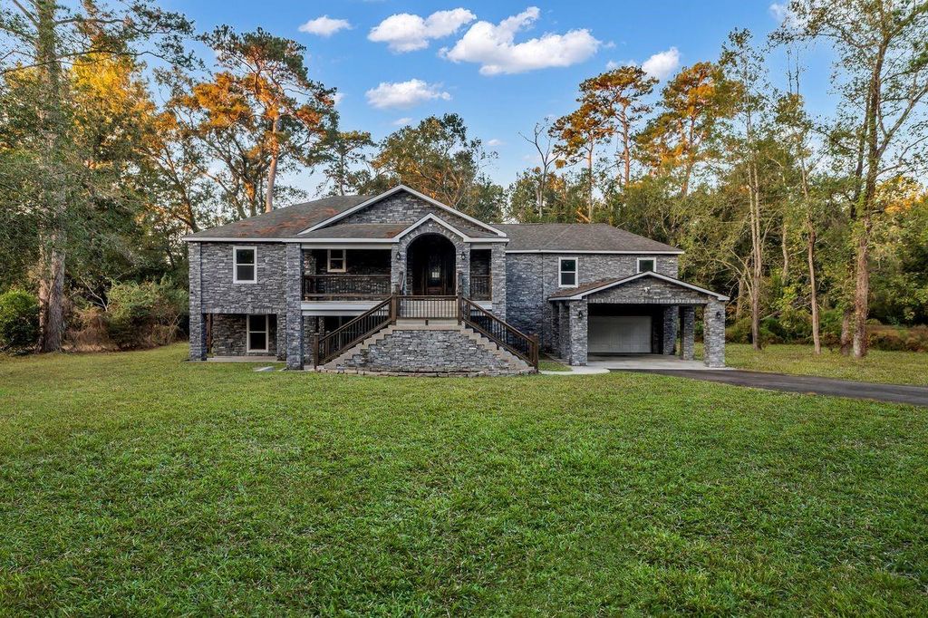 Photo of 83 White Oak Drive N, Woodbranch, TX 77357 (MLS # 30986383)