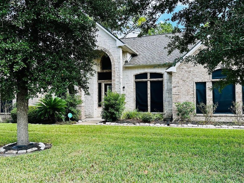 Photo of 12510 Mystery Lane, Mont Belvieu, TX 77523 (MLS # 8824480)