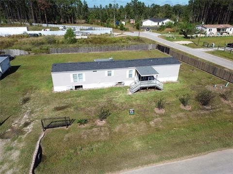 Photo of 239 Road 5027, Cleveland, TX 77327 (MLS # 13928471) Photo of 239 Road 5027, Cleveland, TX 77327 (MLS # 13928471)