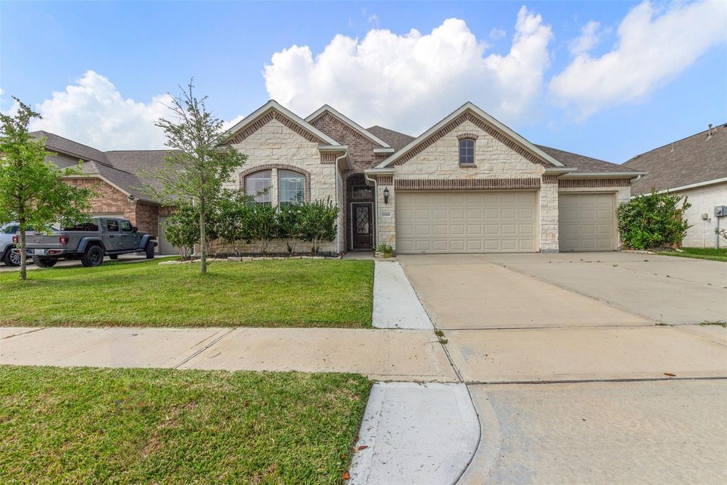 Photo of 25008 Calais New Court Lane, Kingwood, TX 77339 (MLS # 35859213)