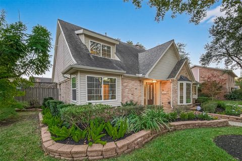 Photo of 11007 Ella Lee Lane, Houston, TX 77042 (MLS # 50939070)
