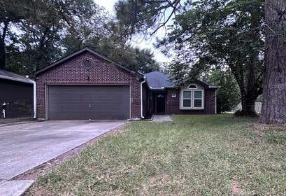 Photo of 600 Spruce Dr DR, Conroe, TX 77302 (MLS # 33461002)