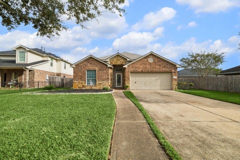 Photo of 10051 Lynnwood Drive, Baytown, TX 77521 (MLS # 26488684)