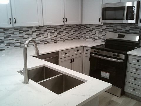 Photo of 13427 Garden Grove Grove #ST750, Houston, TX 77082 (MLS # 34974567)