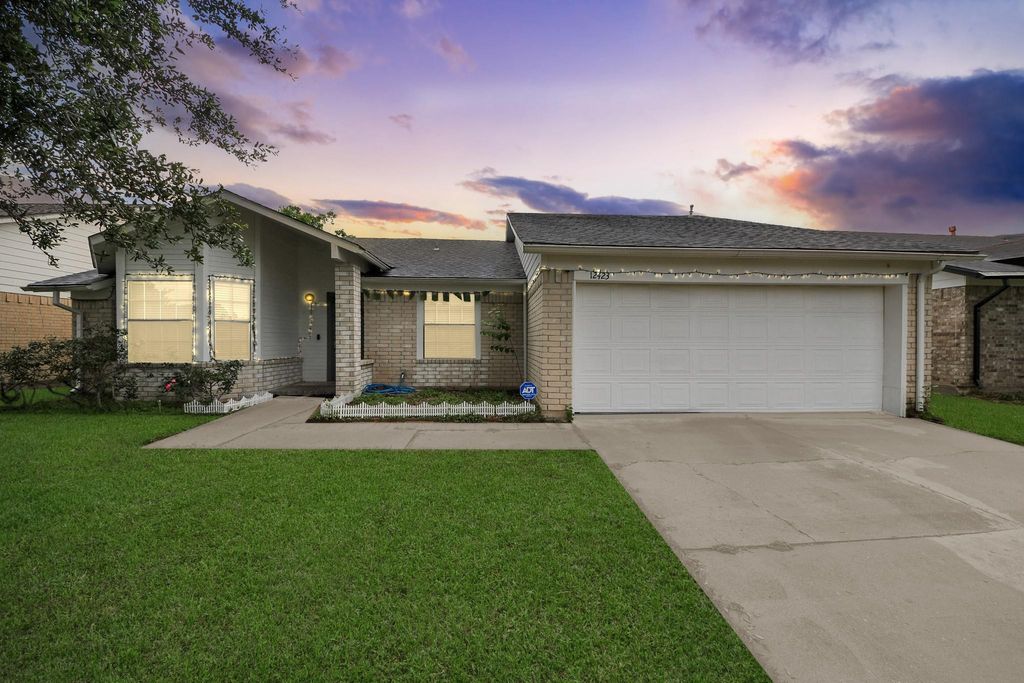 Photo of 12423 Tambourine Drive, Houston, TX 77477 (MLS # 19136262)