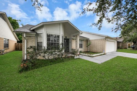 Photo of 12423 Tambourine Drive, Houston, TX 77477 (MLS # 19136262)