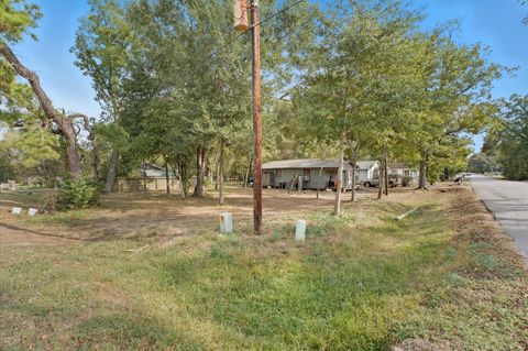 Photo of 801 Avenue H, Conroe, TX 77301 (MLS # 47705401)
