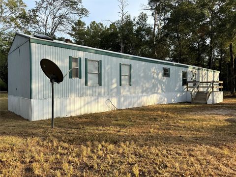 Photo of 143 Mehringer Road, Shepherd, TX 77371 (MLS # 50006135) Photo of 143 Mehringer Road, Shepherd, TX 77371 (MLS # 50006135)