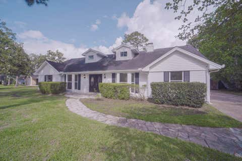 Photo of 1419 Chestnut Ridge Road, Houston, TX 77339 (MLS # 95130379)