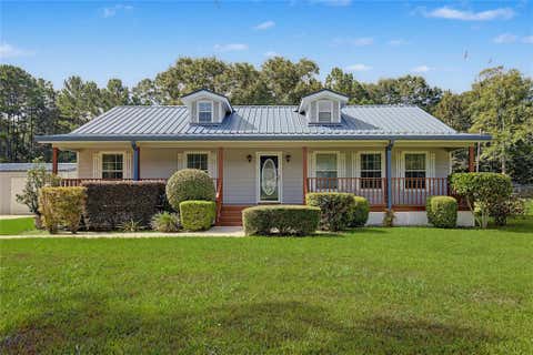 Photo of 26190 Walnut Burl, Cleveland, TX 77328 (MLS # 94126884)