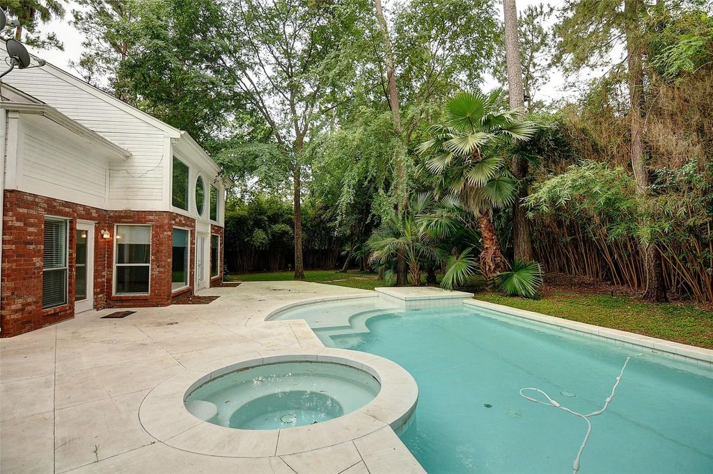 Photo of 10 Indian Sage, The Woodlands, TX 77381 (MLS # 50368109)