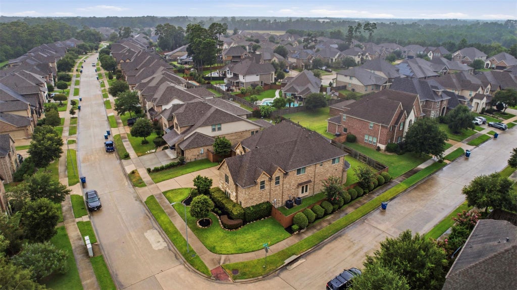 Photo of 13929 North Lake Branch Lane, Houston, TX 77044 (MLS # 72096600)