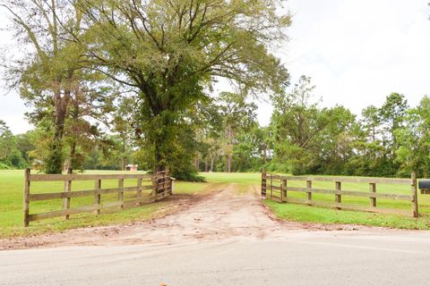 Photo of 697 County Road 2309, Cleveland, TX 77327 (MLS # 78190160)