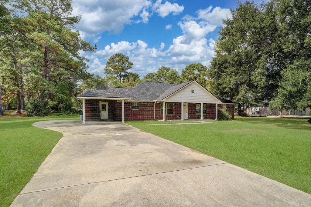 Photo of 201 County Road 2234, Cleveland, TX 77327 (MLS # 8107836)