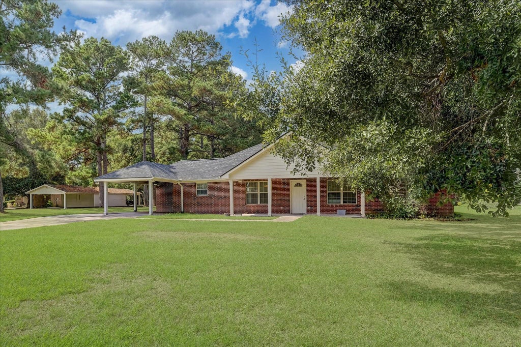 Photo of 201 County Road 2234, Cleveland, TX 77327 (MLS # 8107836)