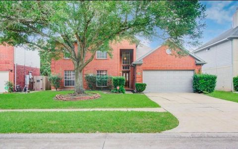 Photo of 911 E Hampton Drive, Pearland, TX 77584 (MLS # 68520436) Photo of 911 E Hampton Drive, Pearland, TX 77584 (MLS # 68520436)