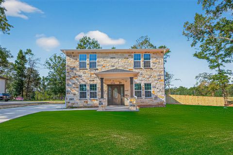 Photo of 10594 Rustling Oaks Drive, Conroe, TX 77303 (MLS # 69230712)