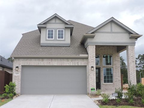 Photo of 12853 Meadow Wind Way Way, Conroe, TX 77302 (MLS # 48591001)