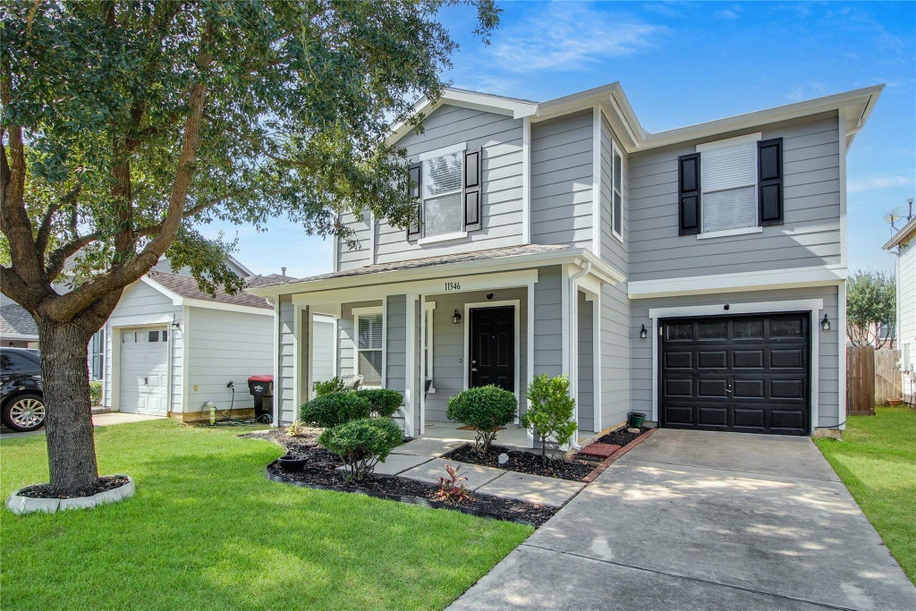 Photo of 11346 Log Cabin Lane, Tomball, TX 77375 (MLS # 53993309)