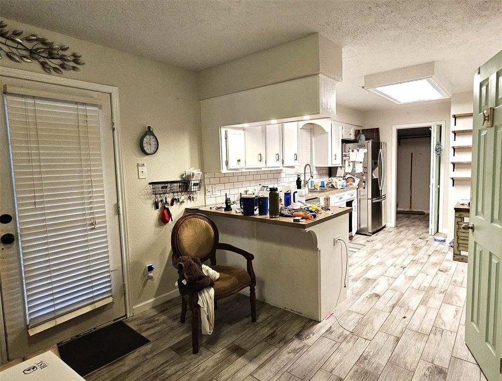 Photo of 1319 E Main Street, Humble, TX 77338 (MLS # 9002597)