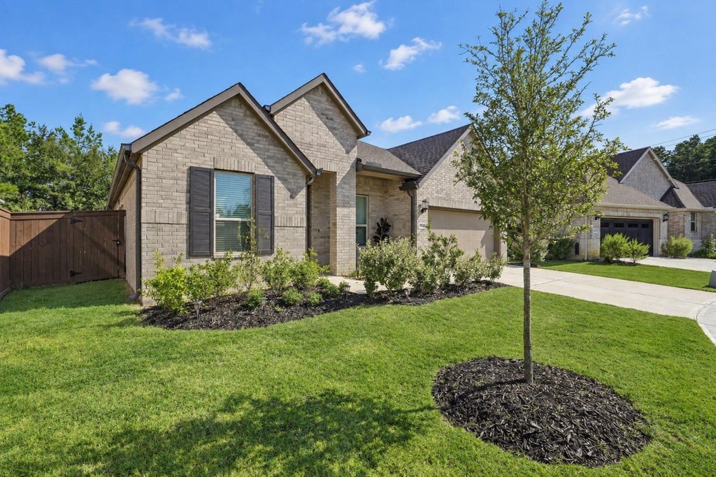 Photo of 29025 Red Loop Drive, New Caney, TX 77357 (MLS # 55686014)
