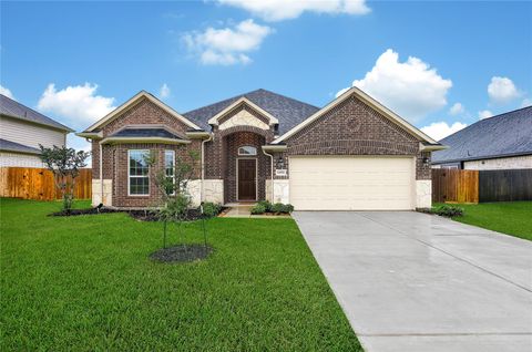Photo of 12002 Champions Forest Drive, Mont Belvieu, TX 77535 (MLS # 95010712)