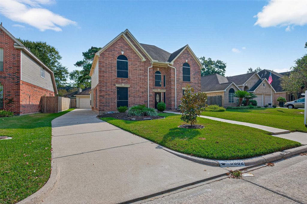 Photo of 5002 Echo Falls Drive, Houston, TX 77345 (MLS # 28916512)