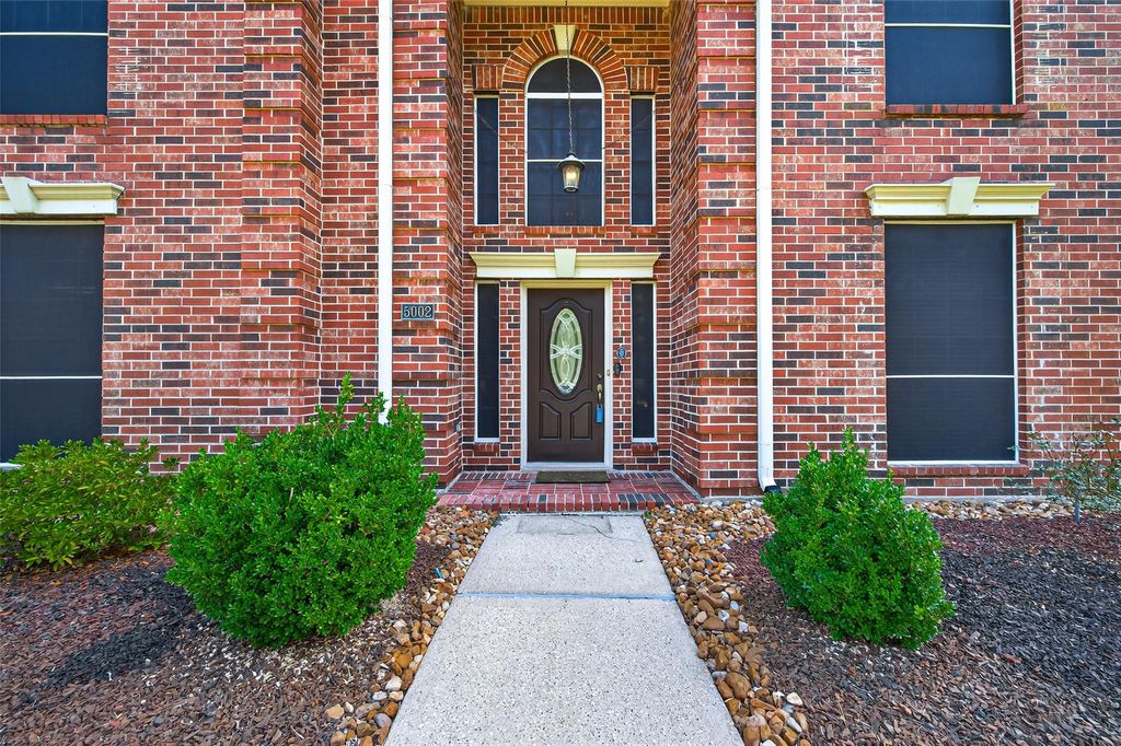 Photo of 5002 Echo Falls Drive, Houston, TX 77345 (MLS # 28916512)