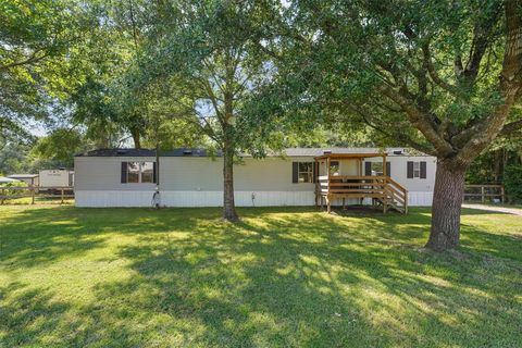 Photo of 106 County Road 3755, Cleveland, TX 77328 (MLS # 52414833)