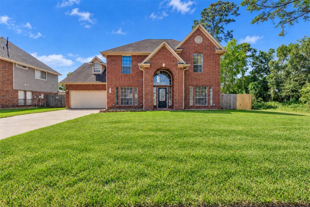 Photo of 1019 Highland Woods Drive, Highlands, TX 77562 (MLS # 91253608)