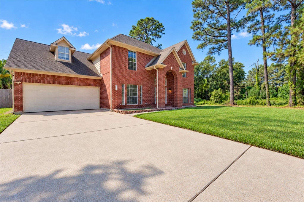 Photo of 1019 Highland Woods Drive, Highlands, TX 77562 (MLS # 91253608)