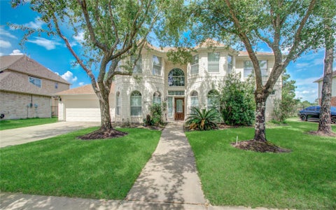 Photo of 10906 Castle Peak Drive, Houston, TX 77095 (MLS # 56264040)