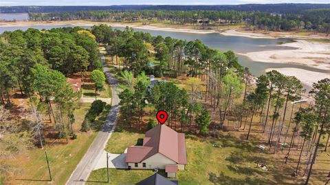 Photo of 647 Shoreline Drive, Brookeland, TX 75931 (MLS # 71796933)