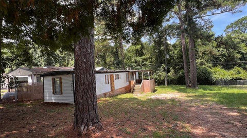 Photo of 14419 W Lee Shore Drive, Willis, TX 77318 (MLS # 10071744)