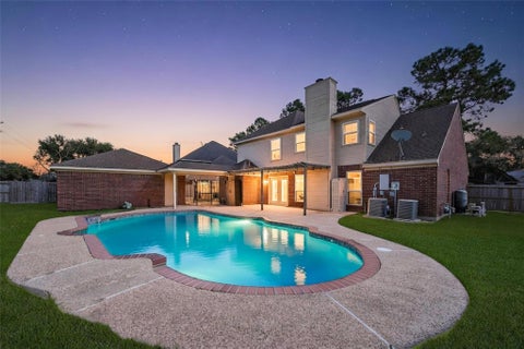 Photo of 17618 Rustling Aspen Lane, Houston, TX 77095 (MLS # 63282642)