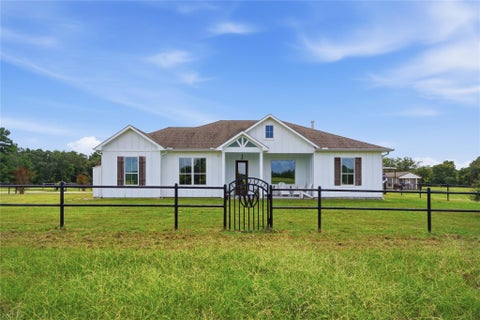 Photo of 681 Emma Rd RD, Oakhurst, TX 77365 (MLS # 80923691)