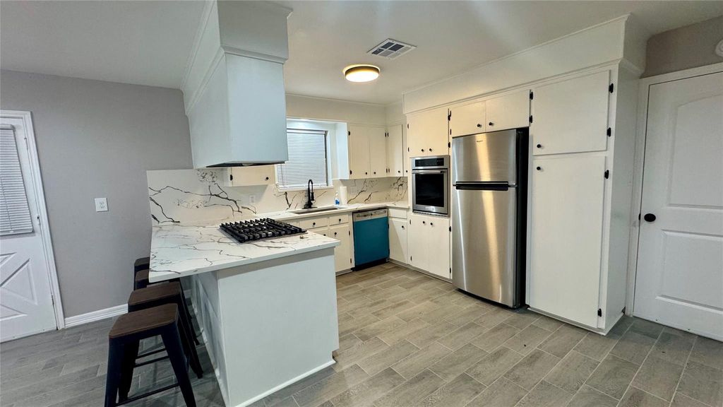 Photo of 202 Massey Tompkins Road, Baytown, TX 77521 (MLS # 18552455)