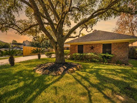 Photo of 7093 Whispering Wind Drive, Willis, TX 77318 (MLS # 31080252)