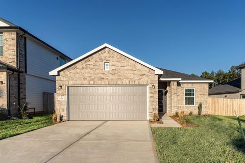 Photo of 10638 Altitude Way, Conroe, TX 77303 (MLS # 71267000)