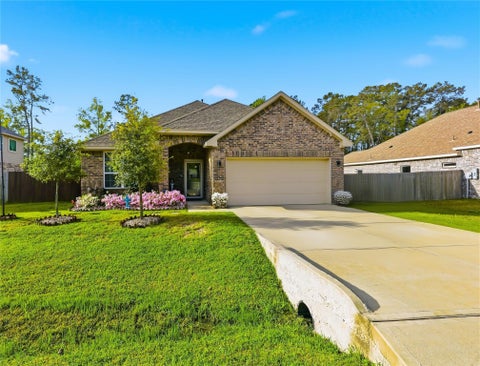 Photo of 658 W Linnwood Drive, New Caney, TX 77357 (MLS # 66373952)