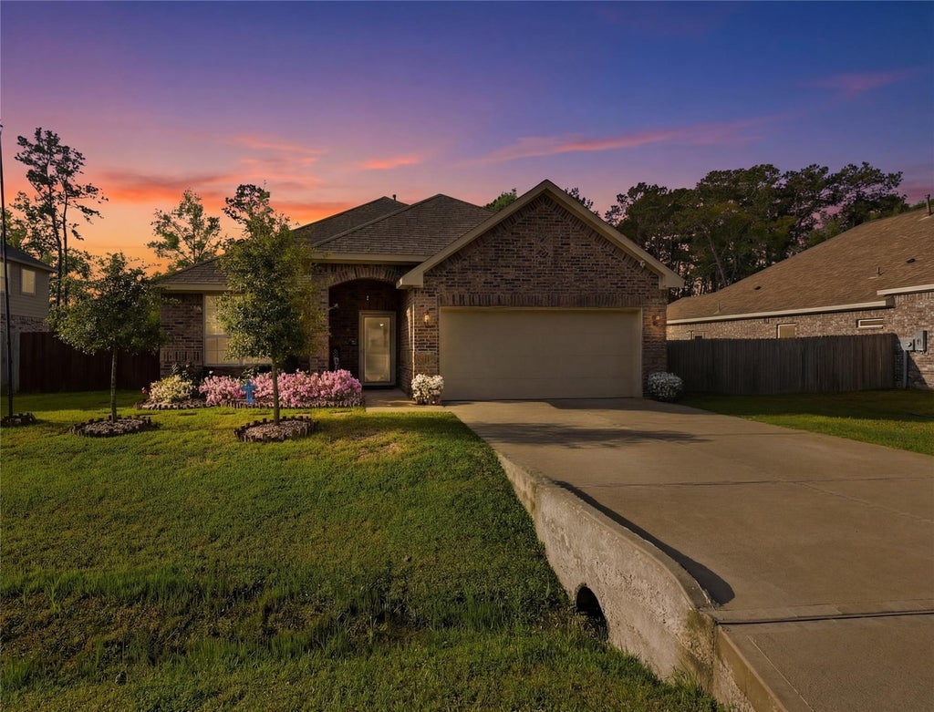Photo of 658 W Linnwood Drive, New Caney, TX 77357 (MLS # 66373952)