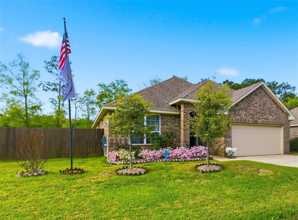 Photo of 658 W Linnwood Drive, New Caney, TX 77357 (MLS # 66373952)