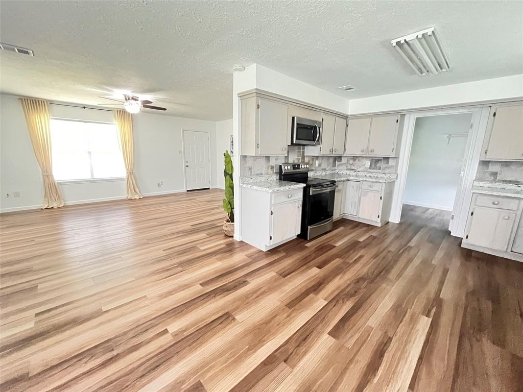 Photo of 21245 Dallas Street, New Caney, TX 77357 (MLS # 72192381)