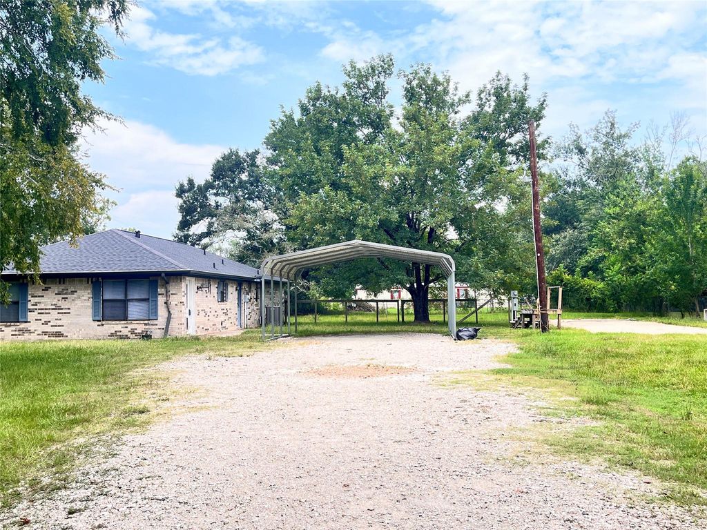 Photo of 21245 Dallas Street, New Caney, TX 77357 (MLS # 72192381)