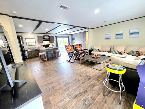 Photo of 141 Canal Drive, Point Blank, TX 77364 (MLS # 58269423)