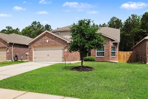 Homes For Sale - 7711 Boulder Sunstone Lane<br/> Conroe, TX 77304