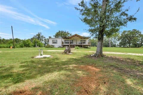 Photo of 8691 River Oaks Drive, Midway, TX 75852 (MLS # 73435298)