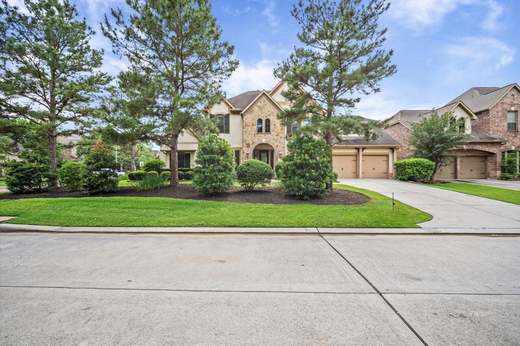 Photo of 241 W Tupelo Green Circle, Spring, TX 77389 (MLS # 93667136)