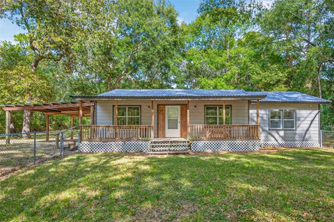 Photo of 450 Dove Creek Dr Dr, Coldspring, TX 77331 (MLS # 87463948)